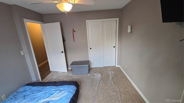 4543 Cathay St, Denver, CO 80249 - unfurnished bedroom featuring a closet, a ceiling fan, and carpet floors
