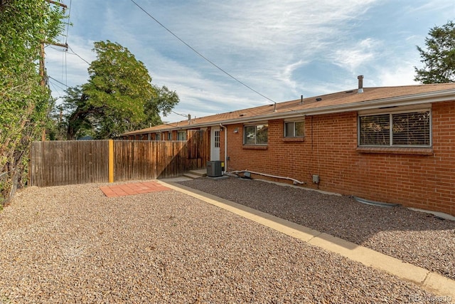 1331 Xanadu St, Aurora, CO 80011 - rear view of house featuring brick siding