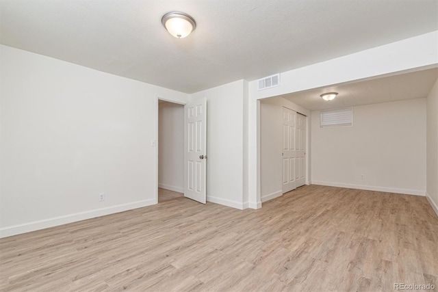 1331 Xanadu St, Aurora, CO 80011 - finished basement with wood finished floors