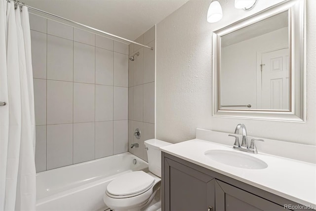 1331 Xanadu St, Aurora, CO 80011 - bathroom featuring shower / tub combo, vanity, and a textured wall