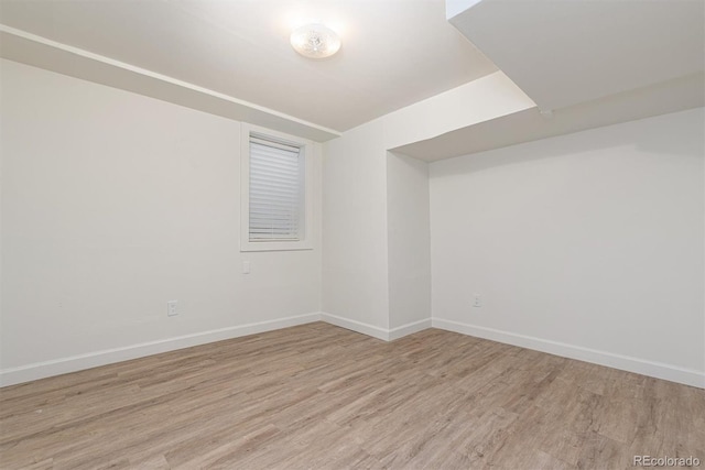 1331 Xanadu St, Aurora, CO 80011 - spare room with light wood-style floors and baseboards