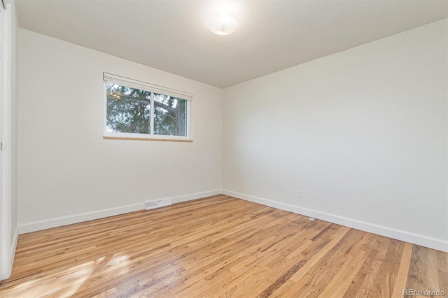 1331 Xanadu St, Aurora, CO 80011 - empty room featuring light wood-type flooring and baseboards