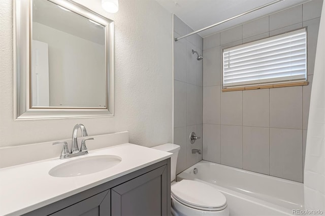 1331 Xanadu St, Aurora, CO 80011 - full bath featuring bathtub / shower combination, vanity, and a textured wall