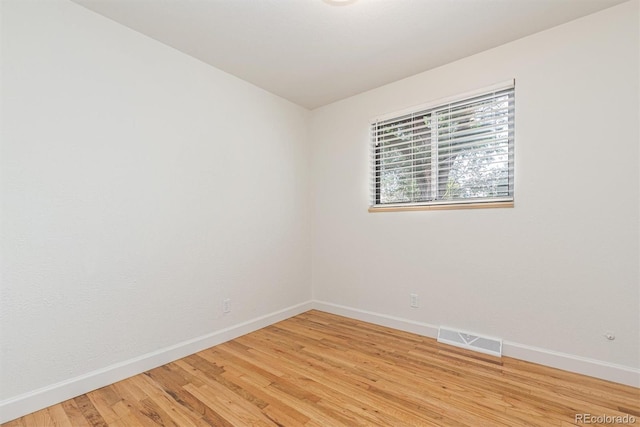 1331 Xanadu St, Aurora, CO 80011 - empty room with baseboards and light wood-type flooring