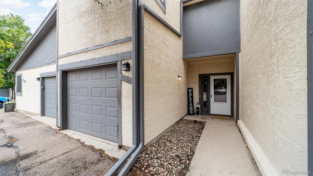 property entrance featuring a garage