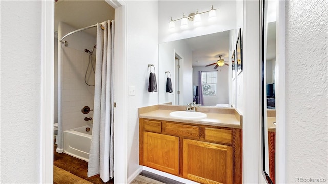 bathroom featuring vanity and shower / tub combo