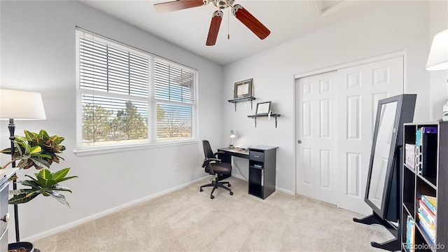 office area with light colored carpet and ceiling fan