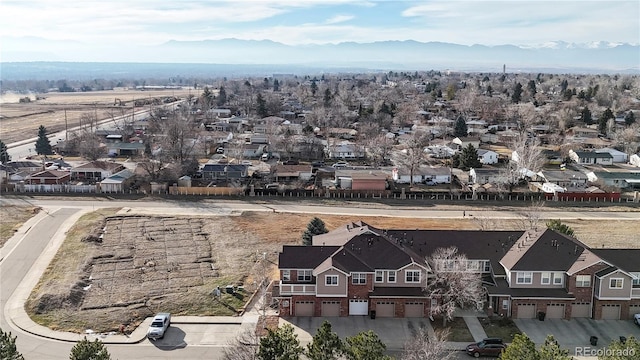 bird's eye view with a mountain view