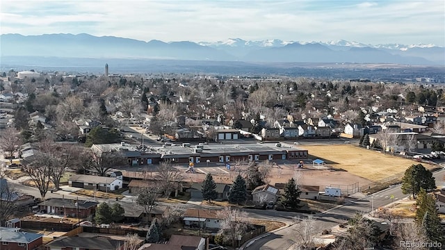 birds eye view of property featuring a mountain view