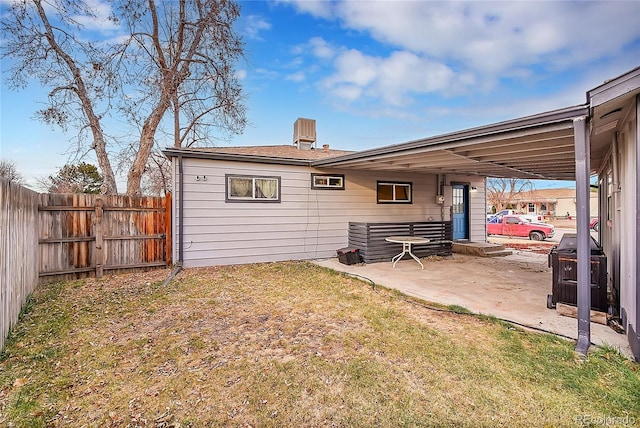 back of house with a patio area