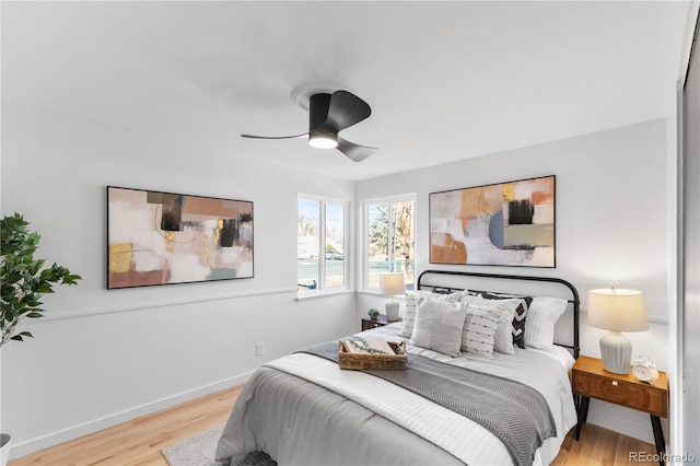 bedroom featuring ceiling fan and light wood-type flooring