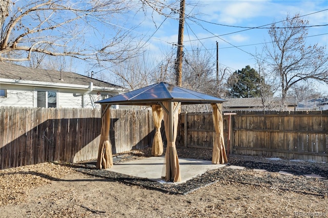 view of yard featuring a gazebo and a patio area