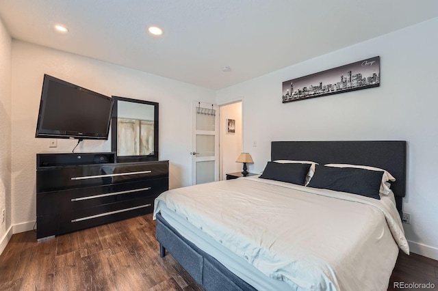 2286 S Pitkin Way Unit A, Aurora, CO 80013 - bedroom featuring dark wood-style flooring and recessed lighting