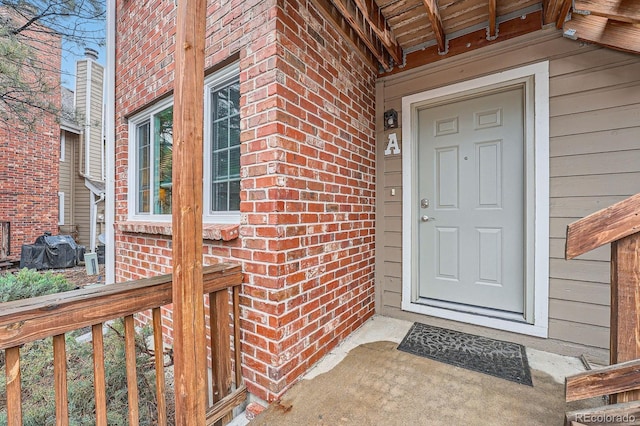 2286 S Pitkin Way Unit A, Aurora, CO 80013 - doorway to property featuring brick siding