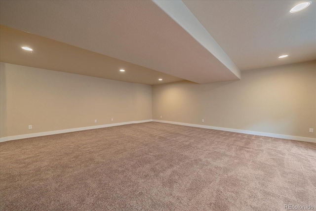 basement featuring carpet flooring