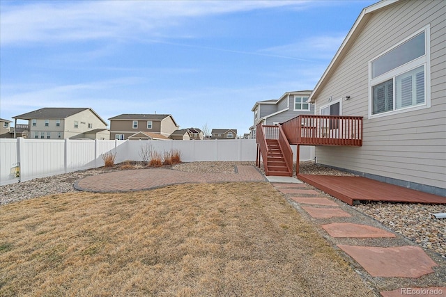 view of yard featuring a wooden deck