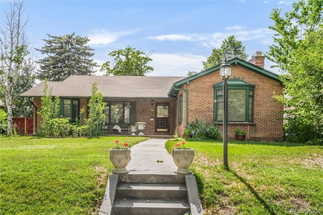 1475 S Monaco St Parkway, Denver, CO 80224 - ranch-style house featuring brick siding and a chimney