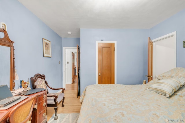 1475 S Monaco St Parkway, Denver, CO 80224 - bedroom featuring light wood-style flooring and a desk