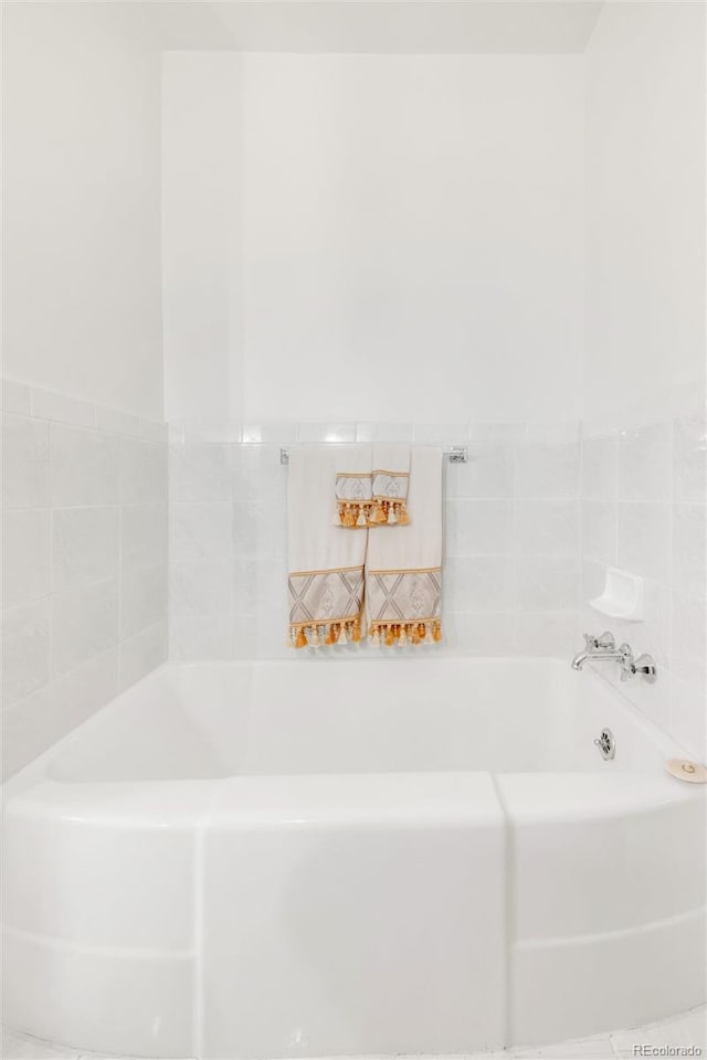 1475 S Monaco St Parkway, Denver, CO 80224 - bathroom featuring a garden tub