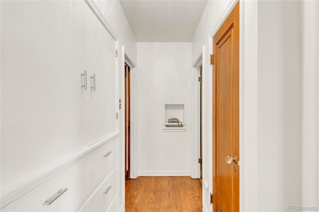 1475 S Monaco St Parkway, Denver, CO 80224 - corridor with light wood-style flooring and baseboards