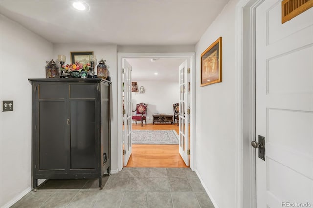 1475 S Monaco St Parkway, Denver, CO 80224 - corridor with light tile patterned flooring and recessed lighting