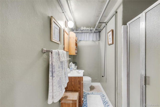 1475 S Monaco St Parkway, Denver, CO 80224 - bathroom with a shower stall and vanity