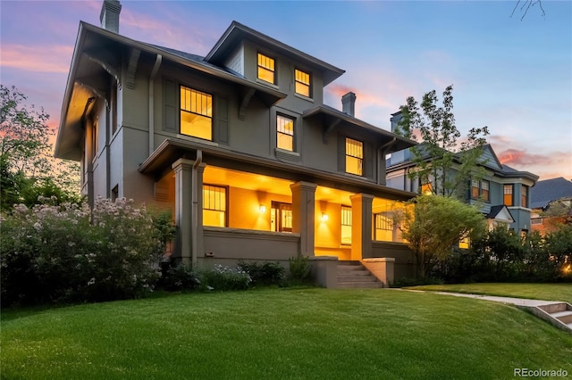 637 N Franklin St, Denver, CO 80218 - view of front of property with a chimney, a front yard, stucco siding, and a porch