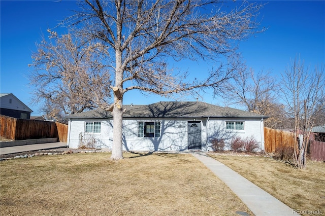 ranch-style house with a front yard