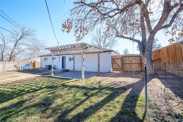 view of yard with a pergola, a patio, and central air condition unit