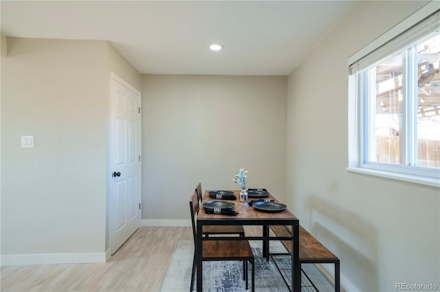 office area with recessed lighting, light wood-type flooring, and baseboards