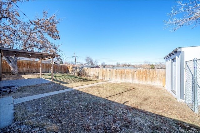 view of yard featuring a fenced backyard and a patio