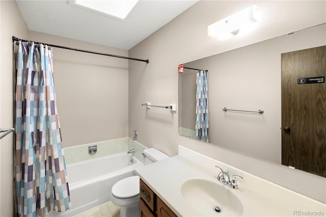 bathroom with vanity, toilet, and shower / bath combo