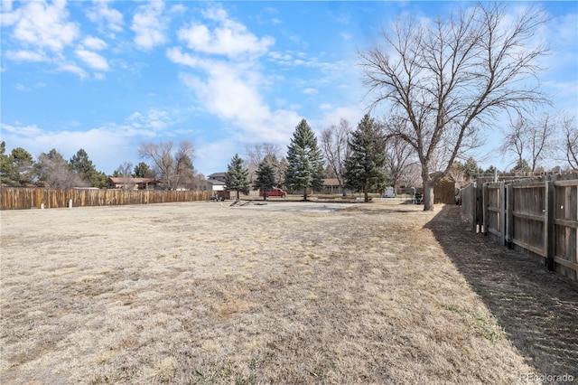 view of yard with fence