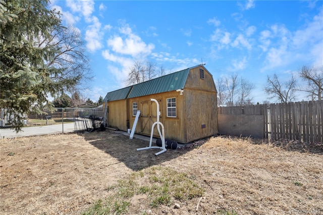 view of shed featuring a fenced backyard