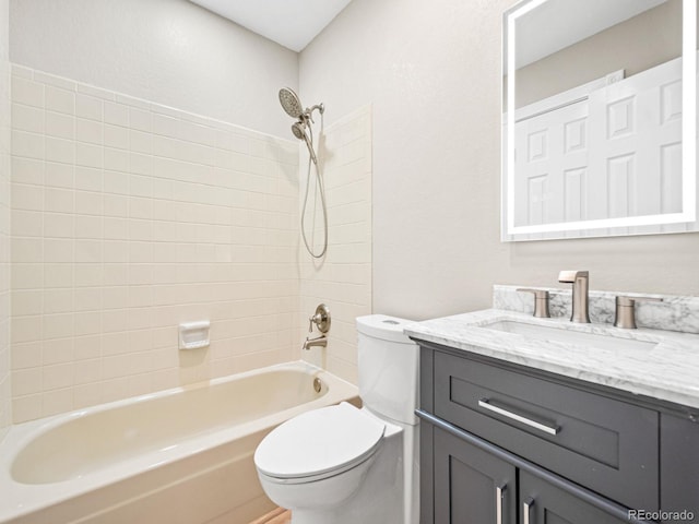 full bath featuring toilet, shower / tub combination, and vanity