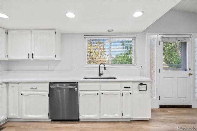 2090 S Fairplay St, Aurora, CO 80014 - kitchen with dishwasher, a sink, light wood-style floors, white cabinets, and recessed lighting
