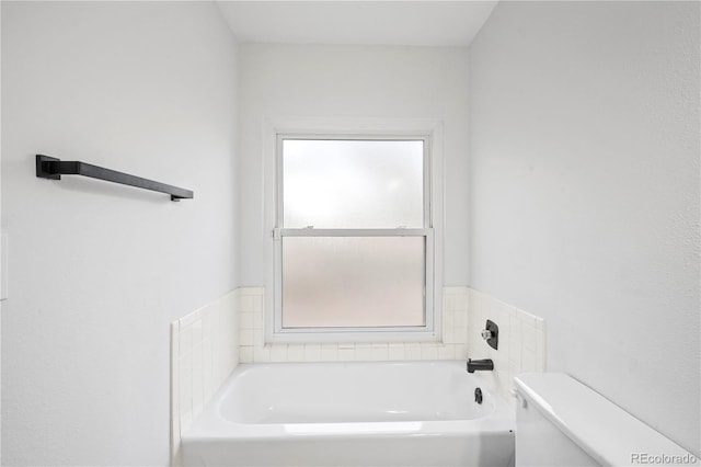 2090 S Fairplay St, Aurora, CO 80014 - bathroom with a garden tub and toilet