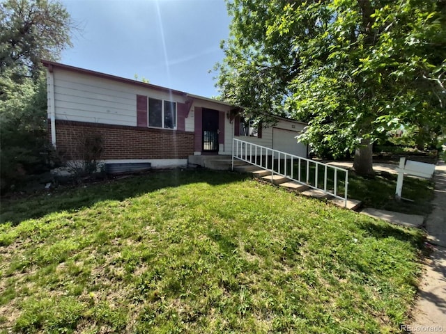 3984 S Pitkin Way, Aurora, CO 80013 - single story home featuring brick siding, a front yard, and an attached garage