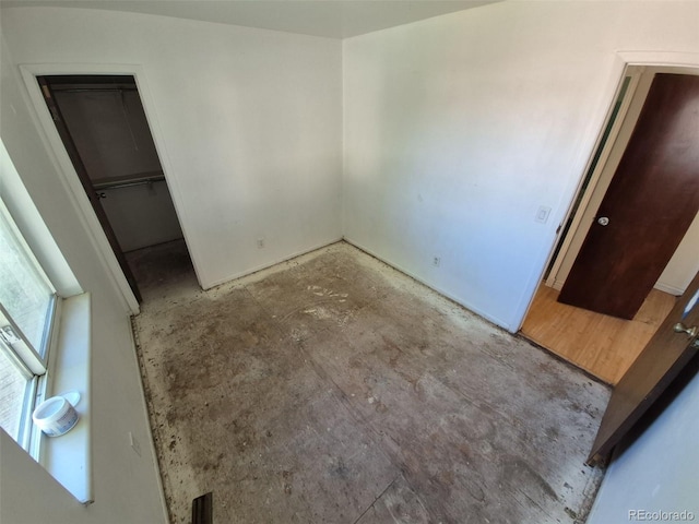 3984 S Pitkin Way, Aurora, CO 80013 - unfurnished bedroom featuring a spacious closet and a closet