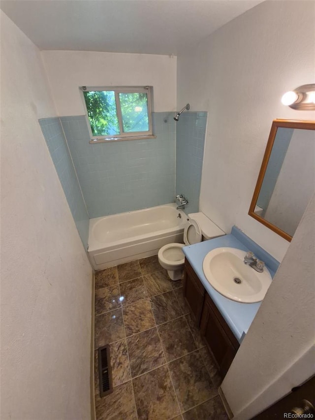 3984 S Pitkin Way, Aurora, CO 80013 - bathroom with shower / bath combination, vanity, and toilet