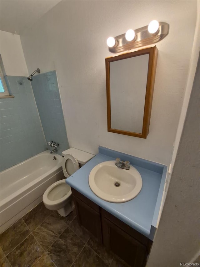 3984 S Pitkin Way, Aurora, CO 80013 - bathroom featuring vanity, shower / washtub combination, and toilet