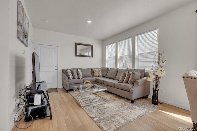 21821 E 7th Ave, Aurora, CO 80018 - living room with light wood-type flooring, baseboards, and recessed lighting