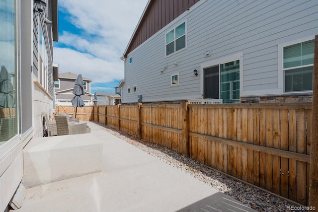 21821 E 7th Ave, Aurora, CO 80018 - view of patio with a fenced backyard