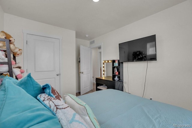 21821 E 7th Ave, Aurora, CO 80018 - bedroom featuring baseboards and visible vents