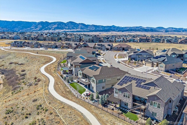 birds eye view of property featuring a mountain view and a residential view