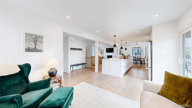 living room with light hardwood / wood-style floors