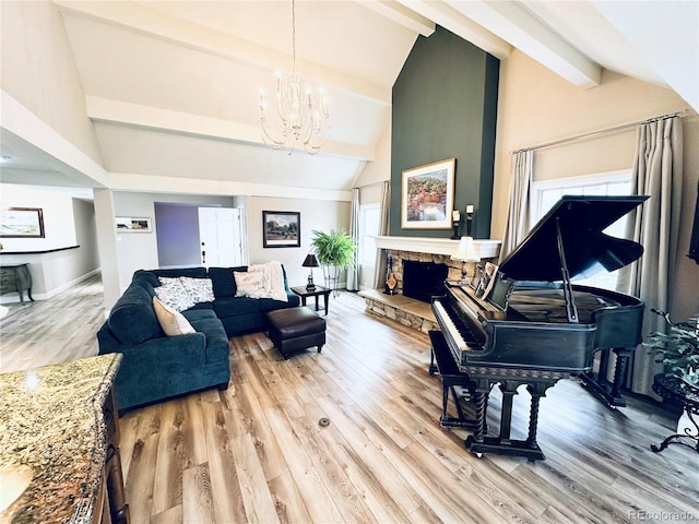 4505 S Yosemite St Unit 102, Denver, CO 80237 - living area featuring wood finished floors, a notable chandelier, high vaulted ceiling, and beam ceiling