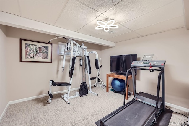 4505 S Yosemite St Unit 102, Denver, CO 80237 - exercise area featuring baseboards, a drop ceiling, and carpet