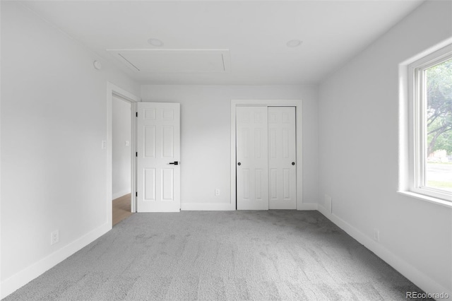 3065 S Eudora St, Denver, CO 80222 - unfurnished bedroom with attic access, carpet floors, and baseboards