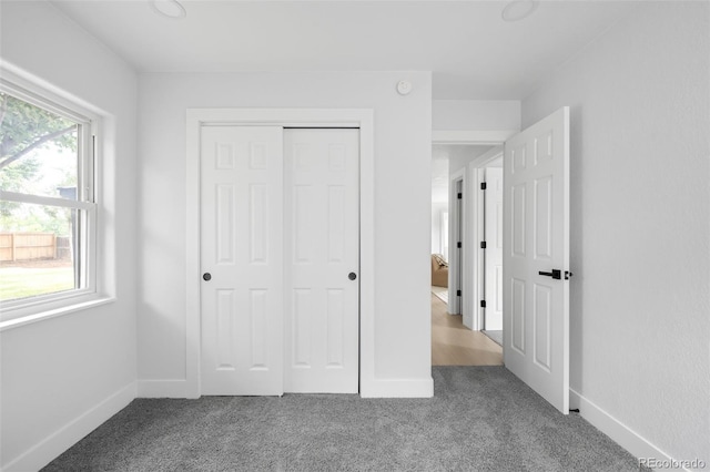 3065 S Eudora St, Denver, CO 80222 - unfurnished bedroom featuring carpet, a closet, and baseboards